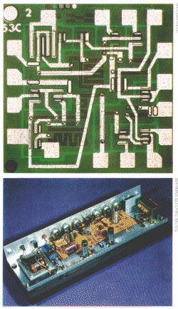 Above: an integrated circuit contains all the components of an amplifier stage, built into a silicon chip which may be as little as 0.2 inches (0.5) cm square and 0.01 inches (0.025 cm) thick. The input and output connections of the circuit are made to the square terminals around the edges of the chip. 
Below: an electric guitar amplifier using valves [tubes] for its amplificahon stages, shown with its casing removed. The large square component on the left is the mains transformer,which reduces the mains voltage to that used by the valves. The output transformer, on the right, feeds the signal from the output stage of the amplifier to the loudspeaker terminals. 